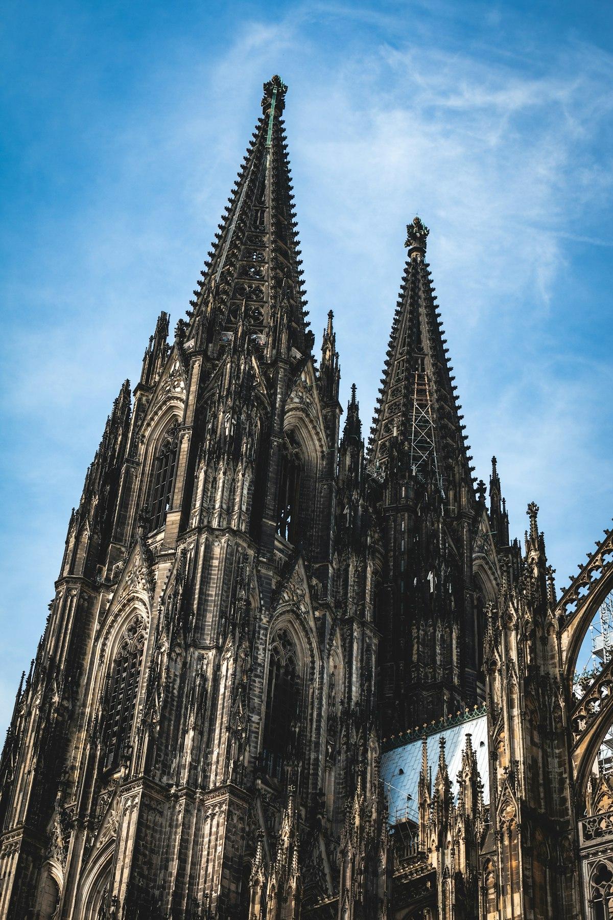 Cologne Cathedral spires against a blue sky, Germany